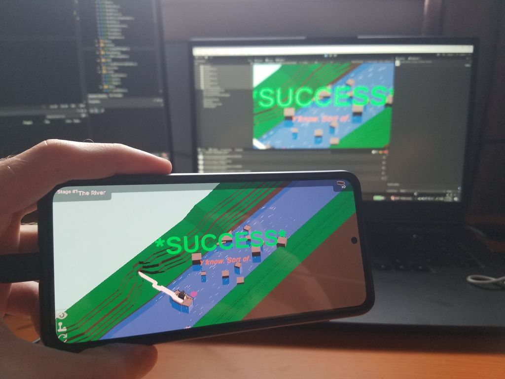 A side-by-side of Riverboat Pachinko displayed on a laptop and on a phone. The menu on-screen reads "SUCCESS! Y'know. Sort of."